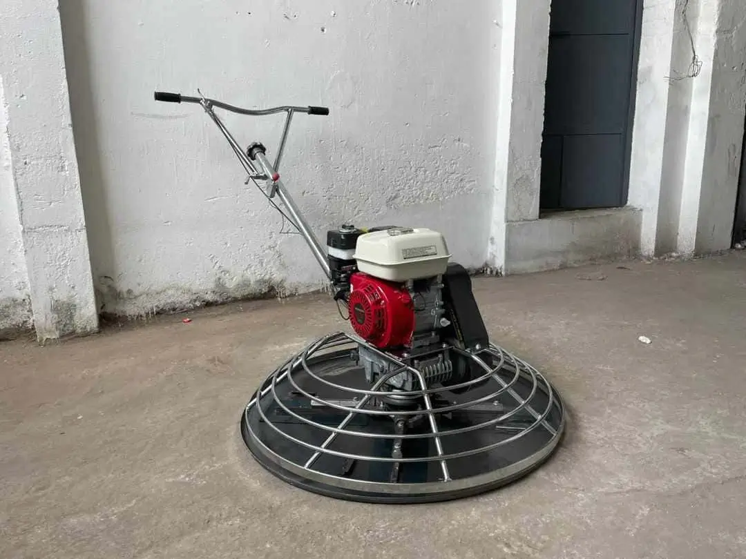 Walk behind trowel finishing residential driveway