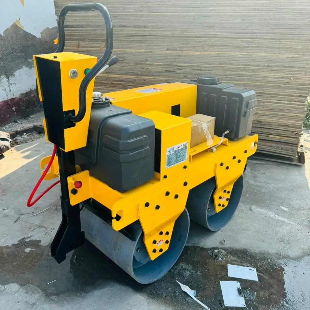 Road roller front view showing vibratory drum and engine assembly